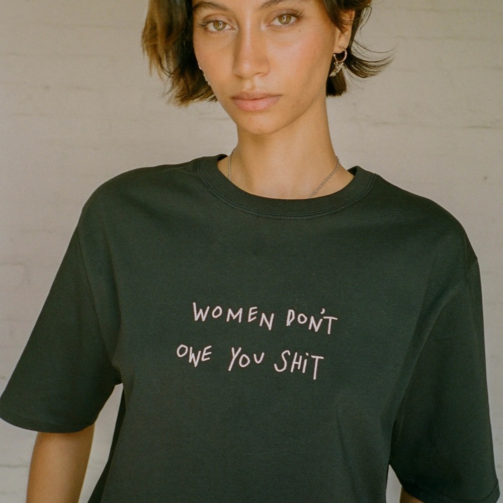 “Women Don’t Owe You Sh*t” Black Graphic Tee by CHNGE - Picture 2 of 8